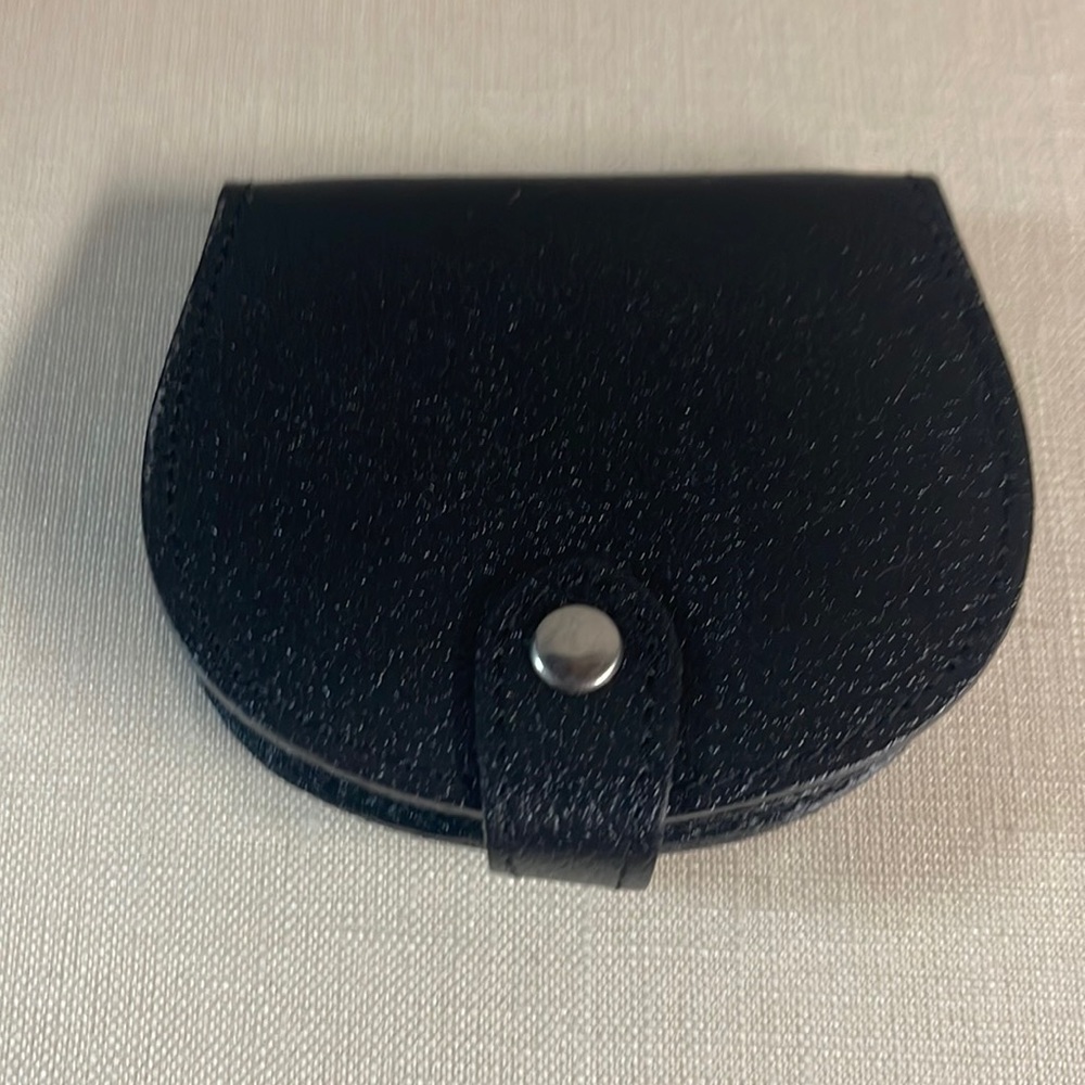 Leather purse/holder for coins, medication or rosary.